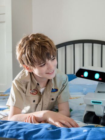 Yonbo smart home robot displaying emotional expressions during interaction.