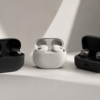 Premium wireless earbuds comparison featuring Sony, Bose, and Sennheiser-inspired earbuds in charging cases on a minimalist studio background.